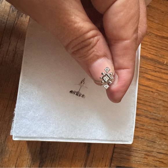 Elegant Silver Stud Earrings - Picture 2 of 4